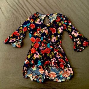 Floral half sleeve body suit
